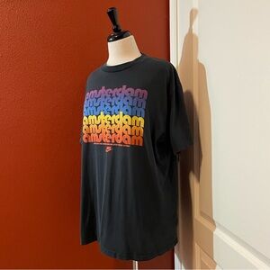 Nike Men’s Amsterdam Faded Black Rainbow Spellout Tee Shirt